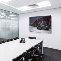 BMW M3 vor Zug – Urbanes Leinwandbild im Schnee-Look | AK Art Auto-Kunstdruck