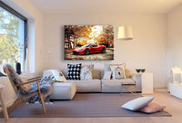 Aston Martin Leinwandbild – Roter Sportwagen in herbstlicher Natur | AK ART Auto Wandbild XXL